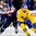 BUFFALO, NEW YORK - JANUARY 2: Slovakia's Peter Kundrik #20 chases Sweden's Isac Lundestrom #20 during the quarterfinal round of the 2018 IIHF World Junior Championship. (Photo by Andrea Cardin/HHOF-IIHF Images)

